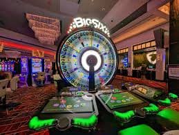 Filipino sports bettor watching live basketball game on okplay slot mobile platform